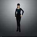 Stylish Woman In Dark Blue Top And Black Pants Standing With Hand On Hip