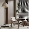 Wooden Frame Lounge Chair With White Cushion Near Floor Lamp Green Plant And Window Blinds