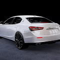 White Maserati Sedan With Sleek Body Design Black Alloy Wheels And LED Headlights