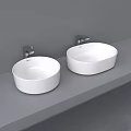 Modern Minimalist Washbasins Mounted On Gray Countertop With Silver Faucets In Bathroom