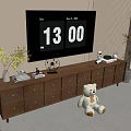 Cozy TV Stand With Multiple Drawers And Cabinets Holding TV Green Plants And Stuffed Toy