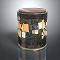 Decorative Cylindrical Container With Dark Surface Brown Lid And Various Paper Stickers 3d model