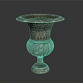 Elegant Indoor Plant In Antique Carved Stone Vase With Intricate Patterns