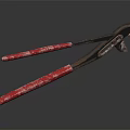Professional Hardware Tool Pliers with Metal Jaws and Red Handles on Dark Background