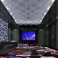 Luxury KTV Lounge Interior With Crystal Chandelier Dark Leather Sofas Colorful Carpet And Wine Shelves