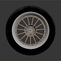 Modern Car Tire With Shiny Metallic Silver Alloy Wheel And Detailed Tread Pattern