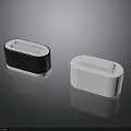 Two Compact Electronic Devices With Black And White Simple Design For Desktop Use