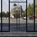 Stylish Modern Lobby Front Desk Reception With Marble Counter Chandelier Glass Doors And Sofa