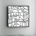 Modern Abstract Black and White Geometric Pattern Artwork Hanging on White Wall