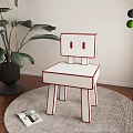 Stylish White Single Chair With Red Trim On Round Rug Near Green Plant And Magazine