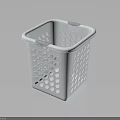 White Plastic Laundry Basket With Perforated Dot Design And Side Handles For Home Organizing