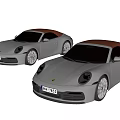 Two Silver Porsche Convertible Sports Cars With Red Tops And Different License Plates