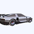 Silver Streamlined Sports Car With Rear Spoiler And Large Alloy Wheels
