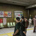 Busy Subway Station Interior With Seats Advertising Boards Escalator And People Walking
