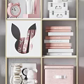 Modern Rabbit Ear Design Bookshelf With Pink White Storage Boxes And Gold Frame