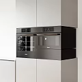 Sleek Modern Built in Black Kitchen Appliances in White Cabinet Design