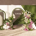 Elegant Floral Installation With Green Arched Structures Large Tropical Leaves And Pink White Blooms