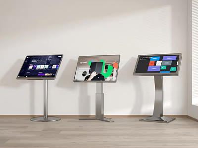 Three Standing Touchscreen Displays Showing Various Content With Wooden Floor And White Wall 3d model