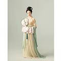 Woman In Traditional Hanfu Holding Round Fan With Classic Hairstyle And Ornaments