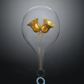 Transparent Glass Bulb Container Holding Two Golden Bells With Bottom Ring Hook On Dark Background
