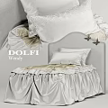 Elegant Single Bed With Ruffled Silk Bedding And Lace Pillows On Gray Headboard