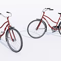 Two Red Classic Bicycles With Vintage Frames And Black Seats