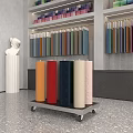 Colorful Fabric Rolls Display On Cart With Shelves In Showroom Interior