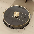 Smart Robot Vacuum Cleaner With Golden Accents For Wooden Floor Cleaning