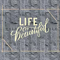Illuminated Lighting Combination Featuring LIFE is beautiful Typography on Black Stone Wall with Decorative Frame
