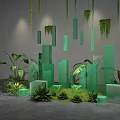 Art Installation With Hanging Green Plants Green Geometric Structures Ground Plants And Gray Wall Lighting