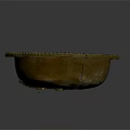 Carved Brass Bowl With Intricate Decorative Rim And Detailed Interior Patterns