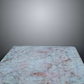 Light Colored Stone Countertop With Mottled Texture On Gray Background Surface