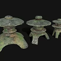 Traditional Wooden Stone Lanterns With Carved Bases In Three Different Sizes