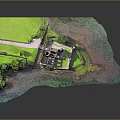 Scenic Island Castle With Stone Tower Ancient Walls Green Grass And Surrounding Water