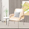 Orange Leather Single Sofa With Black And White Checkered Pillow And Small Round Side Table 3d model