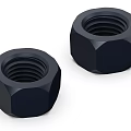 Two Black Hexagon Metal Nuts In Industrial Mechanical Fastening Parts