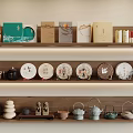Traditional Tea Sets Display on Wooden Shelves with Ceramic Teapots Tea Cakes and Tea Canisters