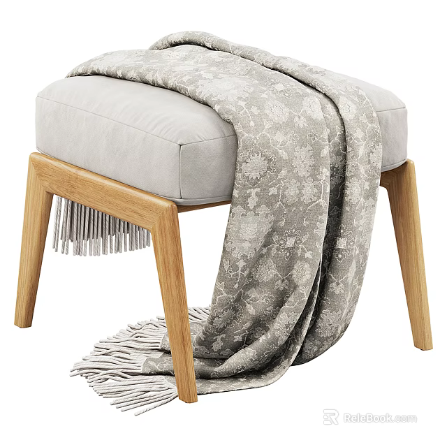 Light Colored Padded Sofa Stool With Wooden Legs And Patterned Fringed Blanket 3d model 