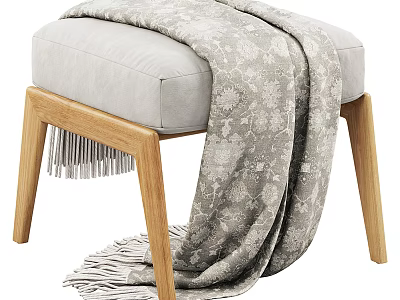 Light Colored Padded Sofa Stool With Wooden Legs And Patterned Fringed Blanket 3d model