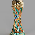 Golden Trophy With Blue Spiral Twisted Design And Colorful Emblem On Top