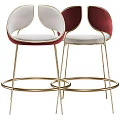 Modern Elegant Bar Stools With Red And White Velvet Upholstery And Golden Metal Frame
