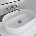 Modern Oval White Countertop Washbasin with Silver Faucet and Grey Wall