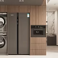 Modern Kitchen Interior With Black Refrigerator Stacked Washing Machine Oven And Wooden Cabinets