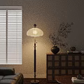 Floor Lamp With Warm Lighting Near Window Blinds And Wooden Cabinet