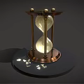 Decorative Hourglass Ornament Set with Gold Frame Black Base and Small Decorative Pieces on Base
