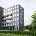 Modern Multi Storey Office Building With Gray Brick Exterior And Green Surroundings