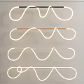 Contemporary LED Chandelier With Curved Design And Soft White Lighting For Modern Interiors
