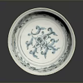 Traditional Blue and White Porcelain Plate Showcasing Exquisite Carved Floral Patterns