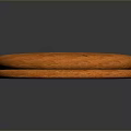 Orange Round Dessert Cake Sliced Into Sections With Textured Surface And Smooth Edges