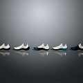 Stylish Modern Sneakers In Various Colors Arranged For Display With Reflective Effect
